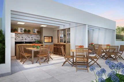 Área de churrasqueira com mesas, cadeiras e forno a carvão.