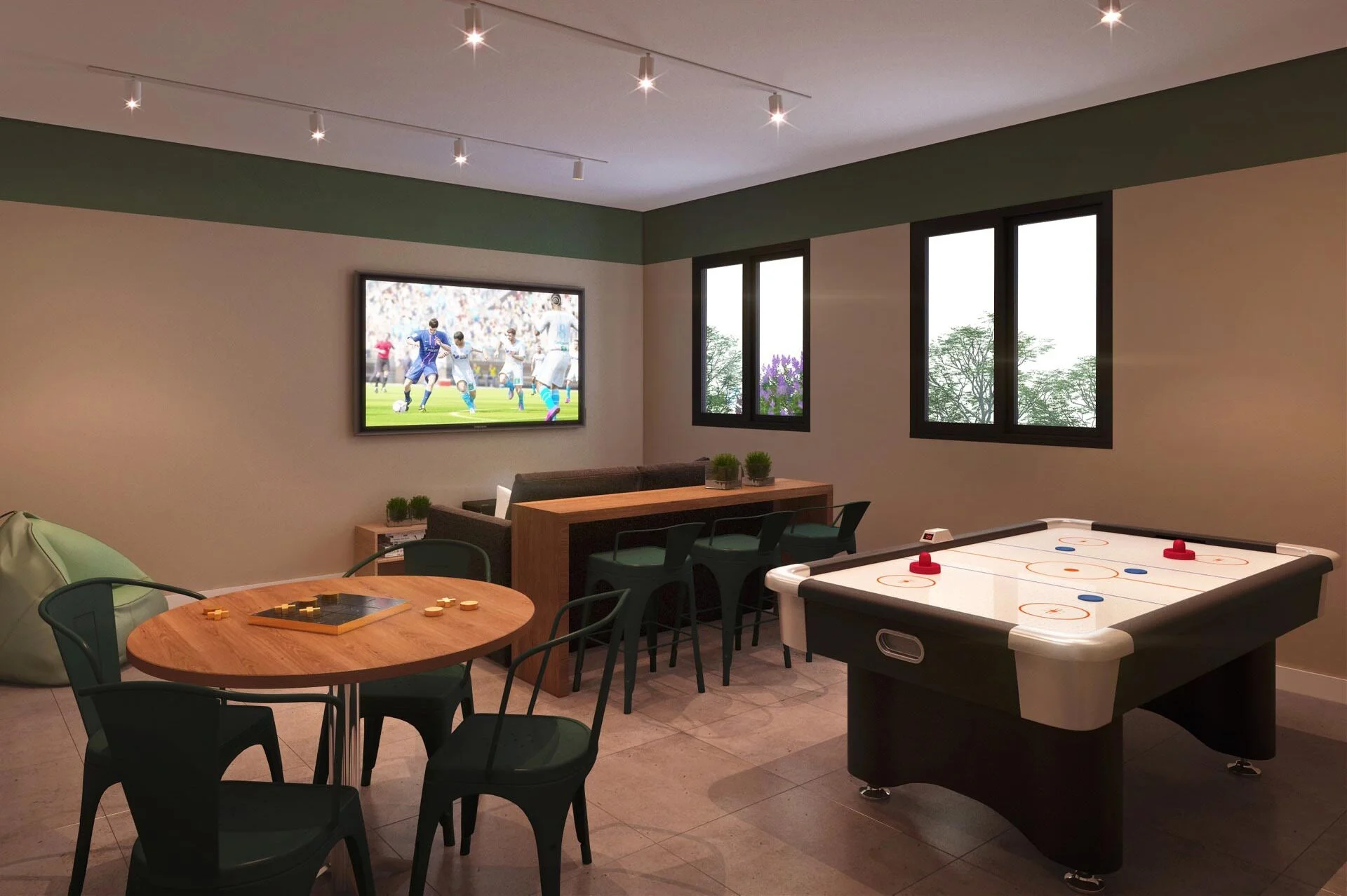 Salão de jogos com mesa de bilhar, pebolim e jogos de tabuleiro.
