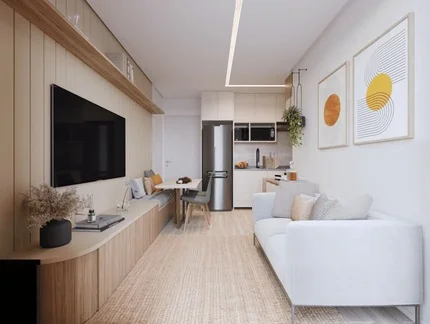 Sala de estar decorada com sofá confortável, mesa de centro, estante para TV e decoração contemporânea.